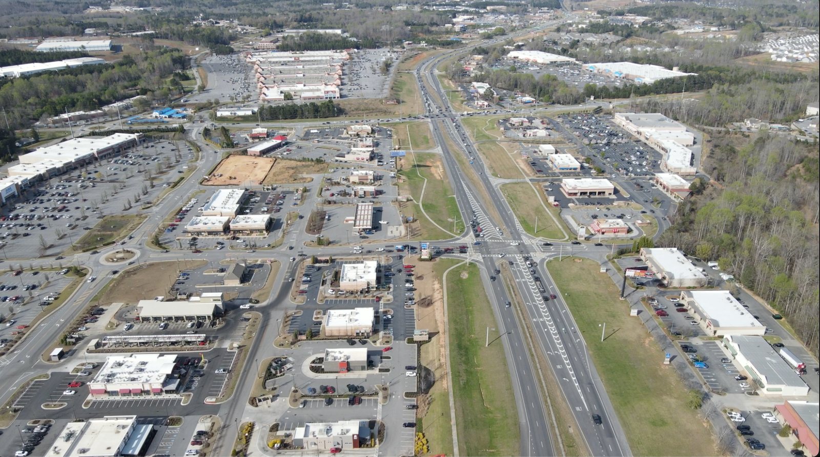 Aerial view of the GA 400 corridor in Dawson County, Georgia, lined with shopping centers