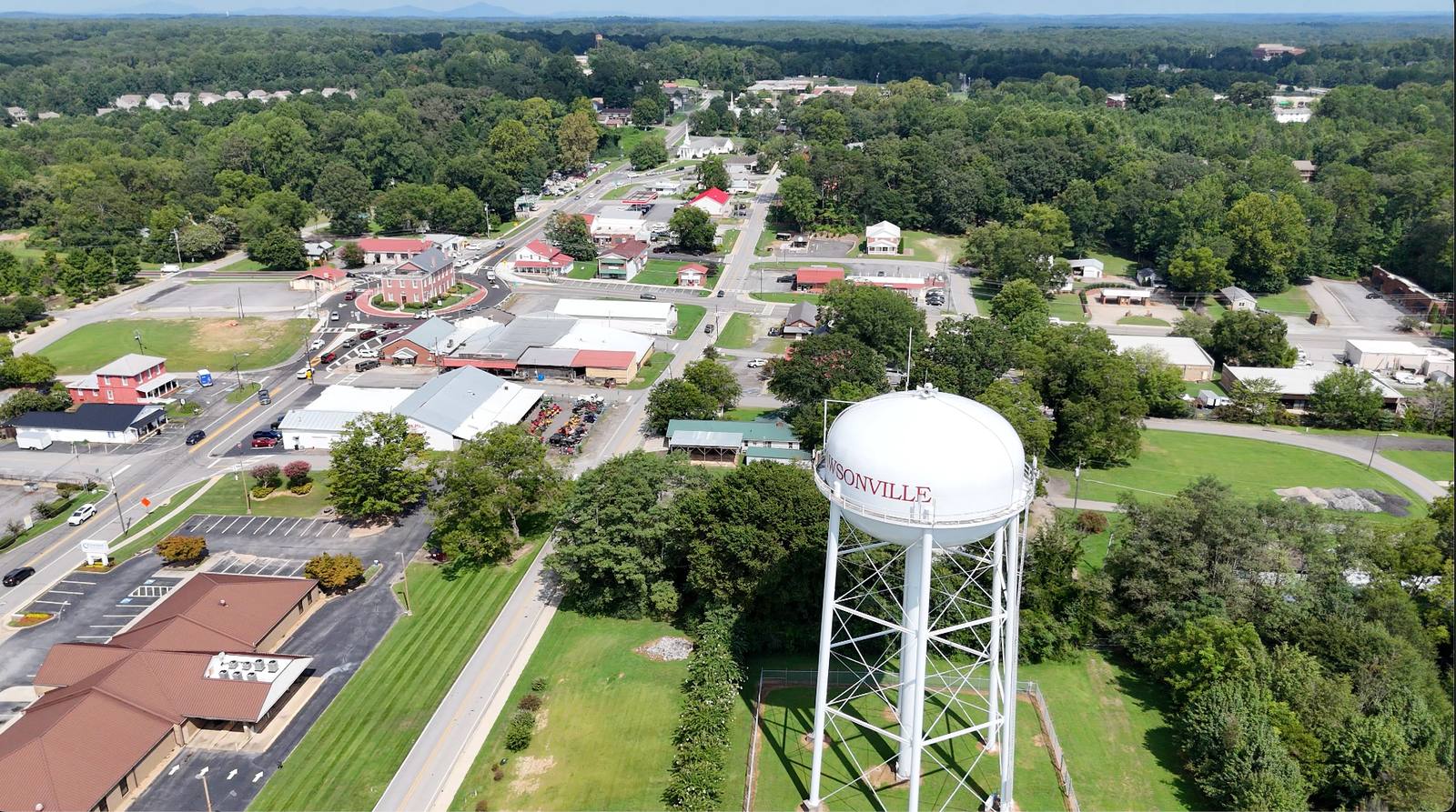 Aerial view of downtown Dawsonville, Georgia, with the city water tower and the courthouse square